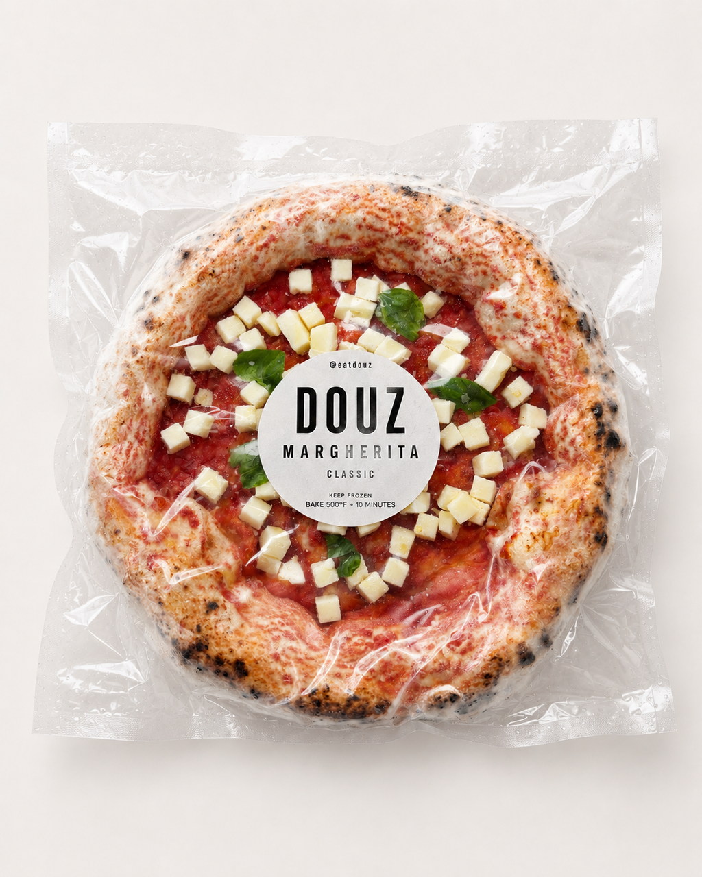 DOUZ Classic Margherita frozen pizza — San Marzano sauce, fior di latte mozzarella and basil on a 72-hour fermented crust, made in Chicago